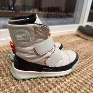 Sorel Kids Snow Boots in White and Black with Orange Accents